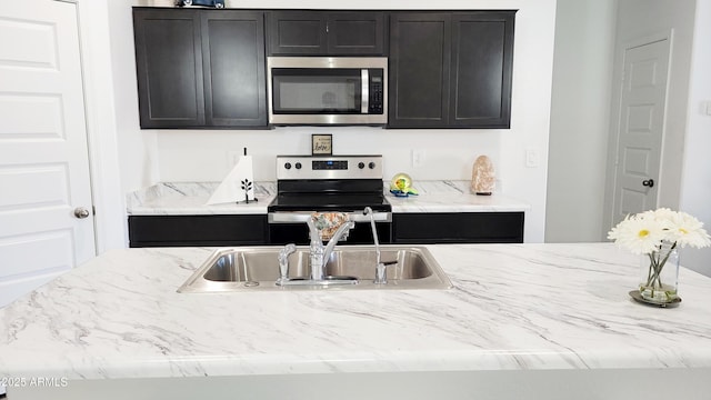 kitchen with sink and stainless steel appliances