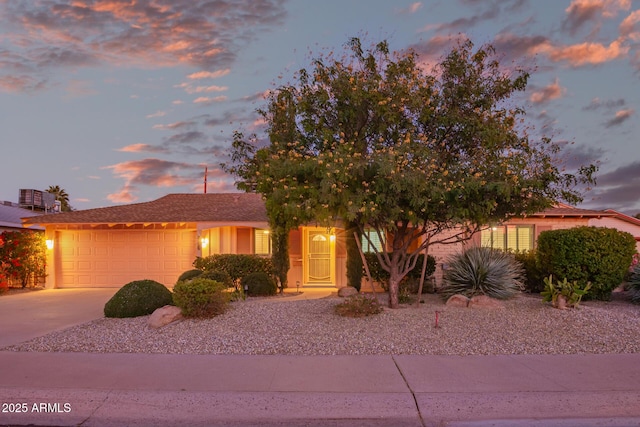 view of front of home with a garage