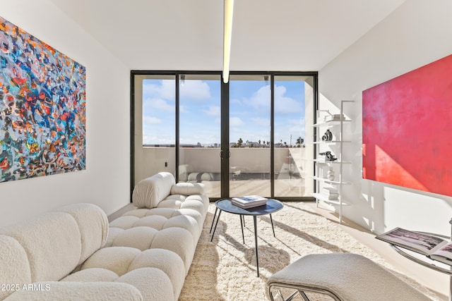 living room with floor to ceiling windows