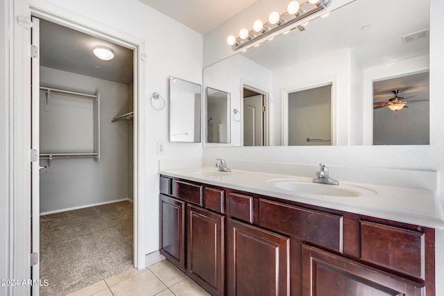 bathroom featuring vanity, ceiling fan, and tile patterned floors