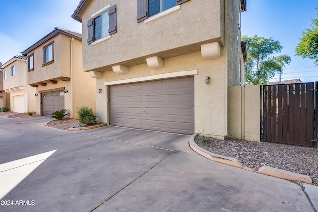 exterior space with a garage