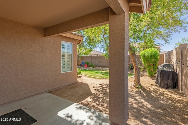 view of patio featuring a fenced backyard