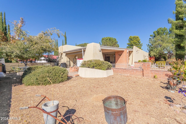 view of adobe home