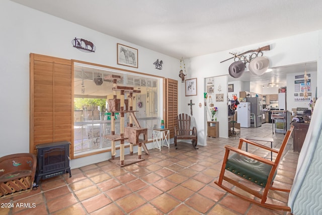 sitting room with a wood stove