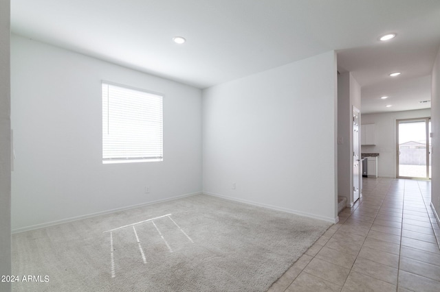 4702 S 109th Ave, Tolleson, AZ 85353 - unfurnished room featuring light tile patterned floors, baseboards, and recessed lighting