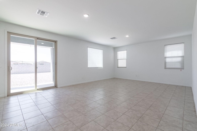 4702 S 109th Ave, Tolleson, AZ 85353 - empty room with recessed lighting, visible vents, and light tile patterned floors