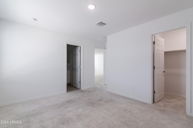 4702 S 109th Ave, Tolleson, AZ 85353 - unfurnished bedroom with visible vents, baseboards, carpet flooring, and a spacious closet