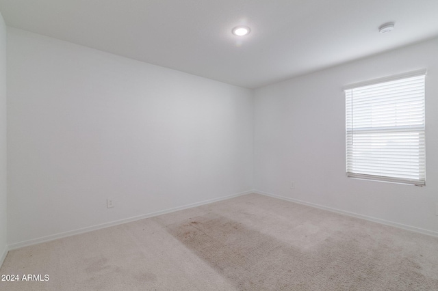4702 S 109th Ave, Tolleson, AZ 85353 - carpeted empty room with baseboards