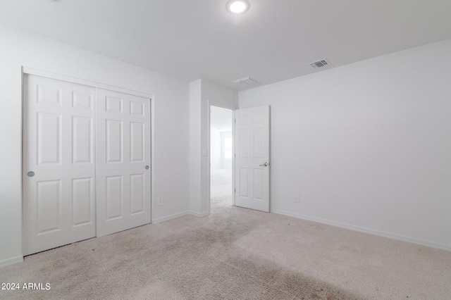 4702 S 109th Ave, Tolleson, AZ 85353 - unfurnished bedroom with baseboards, visible vents, carpet, and a closet