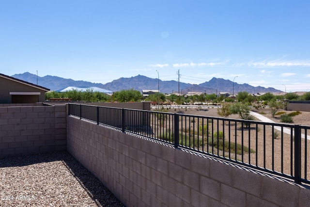 4702 S 109th Ave, Tolleson, AZ 85353 - view of patio with fence and a mountain view