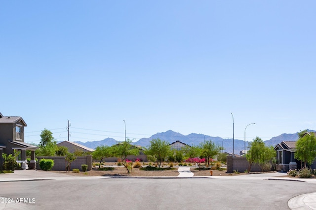 4702 S 109th Ave, Tolleson, AZ 85353 - view of road featuring street lighting, sidewalks, and a mountain view