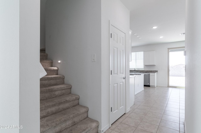 4702 S 109th Ave, Tolleson, AZ 85353 - stairs featuring tile patterned floors, baseboards, and recessed lighting