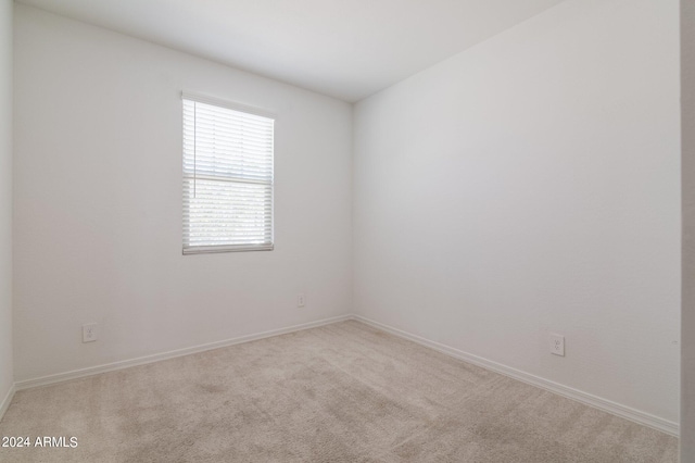 4702 S 109th Ave, Tolleson, AZ 85353 - carpeted empty room with baseboards