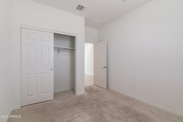 4702 S 109th Ave, Tolleson, AZ 85353 - unfurnished bedroom with baseboards, visible vents, carpet, and a closet