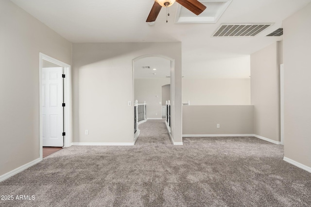 empty room featuring carpet flooring and ceiling fan