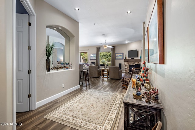 hall with dark hardwood / wood-style flooring