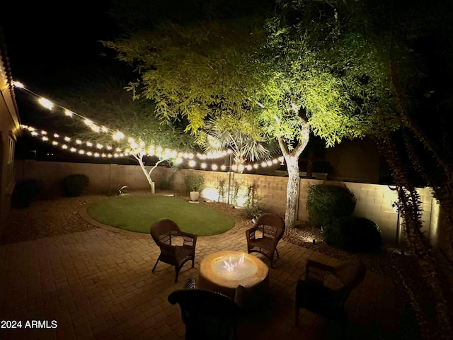 view of patio at twilight