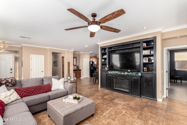 living room with ceiling fan and ornamental molding