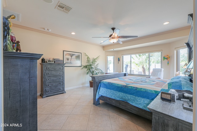 tiled bedroom featuring ornamental molding and ceiling fan