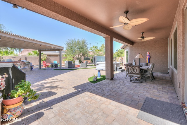 view of patio with ceiling fan