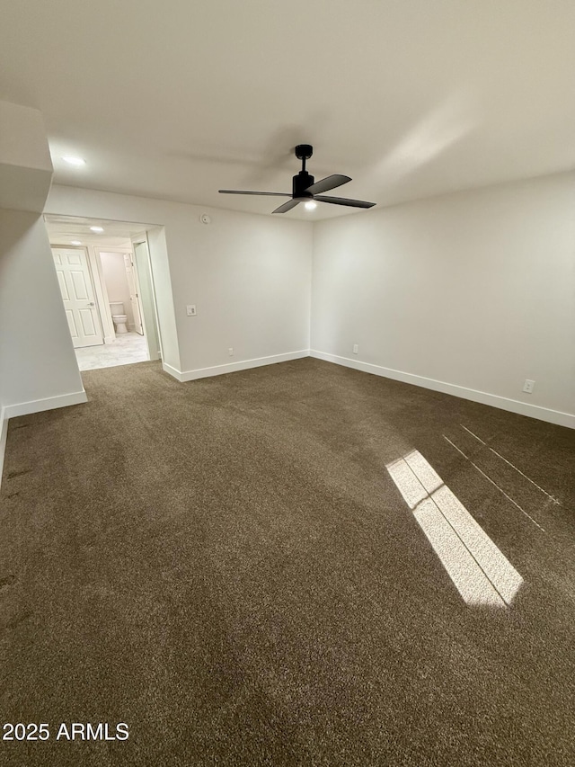 carpeted empty room with ceiling fan