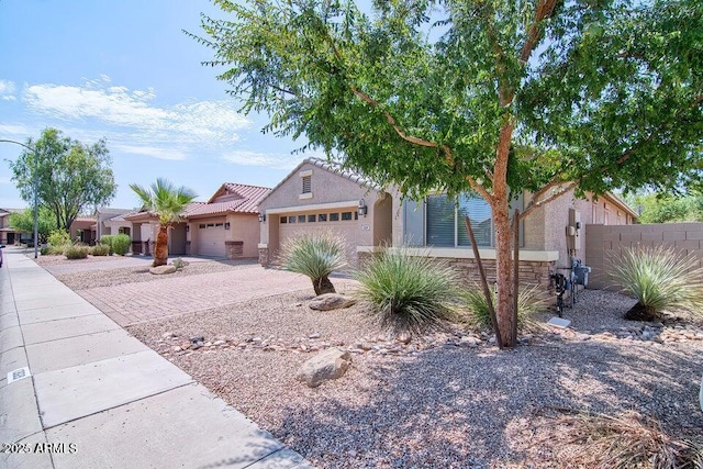 view of front of home with a garage