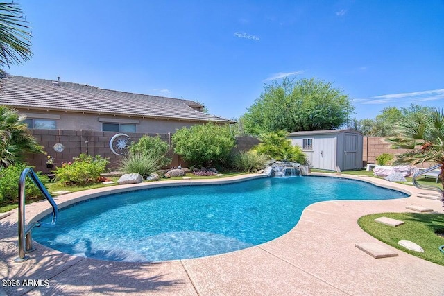 view of pool featuring pool water feature and a storage unit