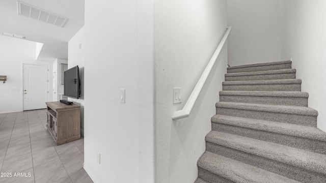 14870 W Encanto Blvd Unit 1059, Goodyear, AZ 85395 - stairs featuring tile patterned flooring