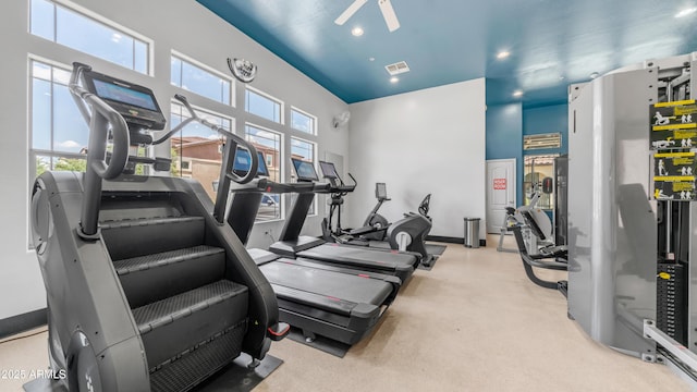 14870 W Encanto Blvd Unit 1059, Goodyear, AZ 85395 - exercise room with plenty of natural light and recessed lighting
