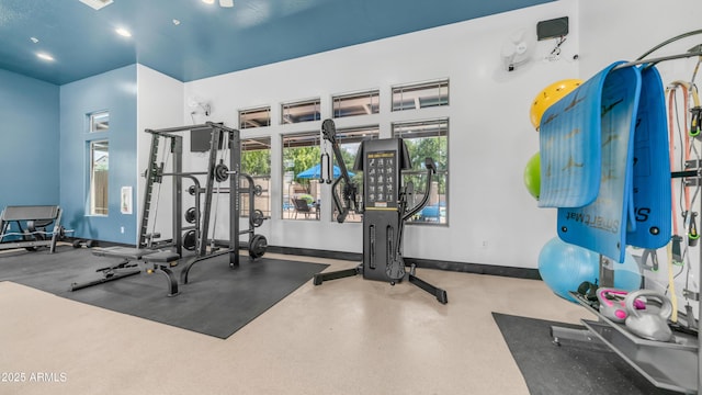 14870 W Encanto Blvd Unit 1059, Goodyear, AZ 85395 - exercise room featuring baseboards