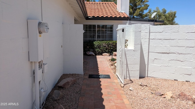 1044 N Arvada N, Mesa, AZ 85205 - view of property exterior with a tile roof and stucco siding