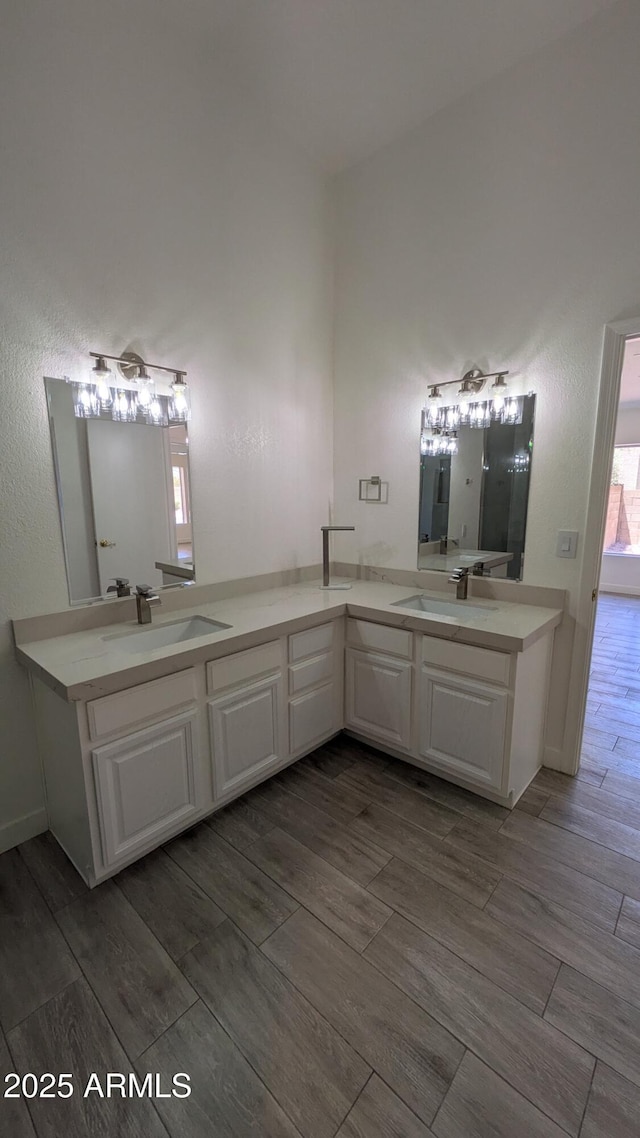 1044 N Arvada N, Mesa, AZ 85205 - full bath featuring double vanity and wood finish floors