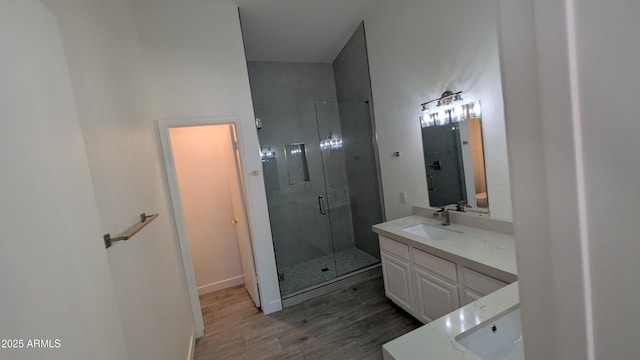1044 N Arvada N, Mesa, AZ 85205 - bathroom with vanity, wood finished floors, and a stall shower