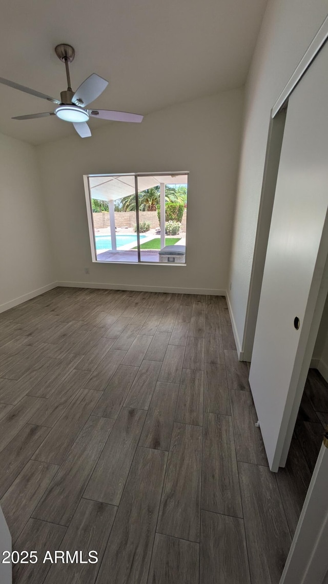 1044 N Arvada N, Mesa, AZ 85205 - empty room featuring dark wood-type flooring and a ceiling fan