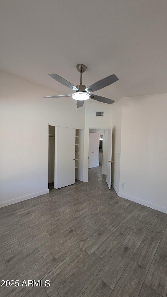 1044 N Arvada N, Mesa, AZ 85205 - empty room featuring dark wood-style flooring and ceiling fan