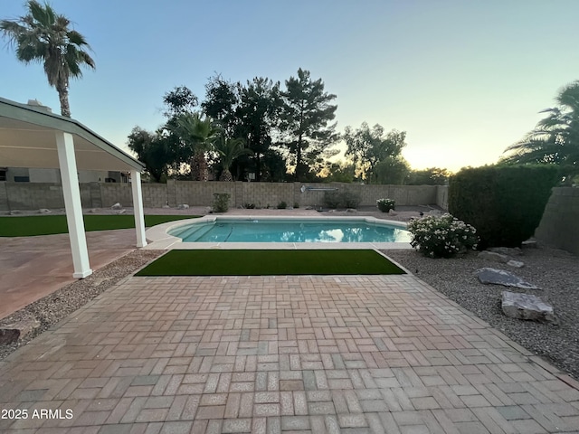 1044 N Arvada N, Mesa, AZ 85205 - view of pool featuring a fenced backyard and a patio