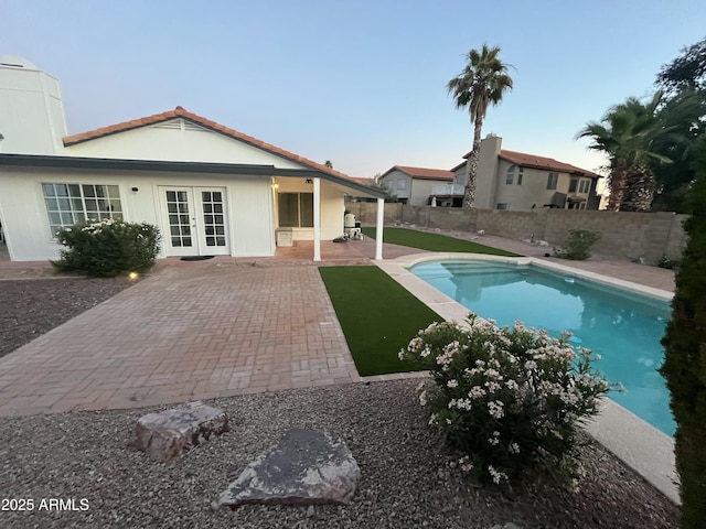 1044 N Arvada N, Mesa, AZ 85205 - view of pool with french doors, a patio area, and a fenced backyard
