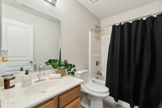 full bathroom featuring toilet, vanity, and shower / tub combo with curtain