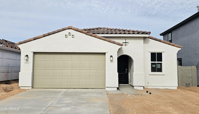 view of front of property with a garage