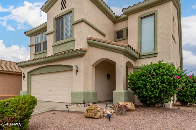 view of front of home with a garage