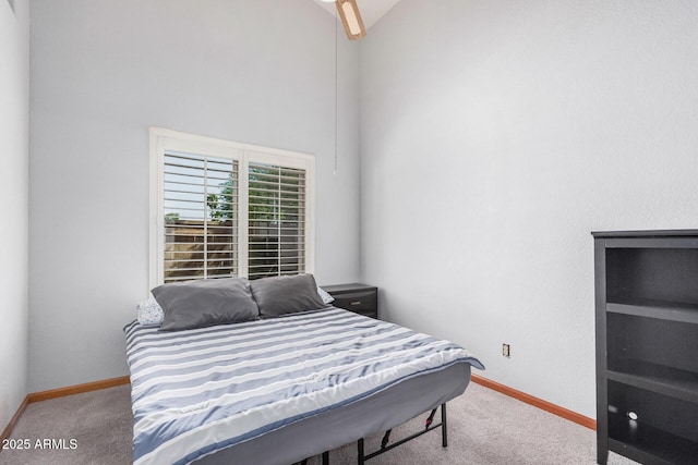 9414 S La Rosa Dr, Tempe, AZ 85284 - carpeted bedroom featuring baseboards and high vaulted ceiling