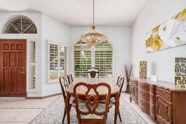 9414 S La Rosa Dr, Tempe, AZ 85284 - dining area with a chandelier, light tile patterned floors, and baseboards
