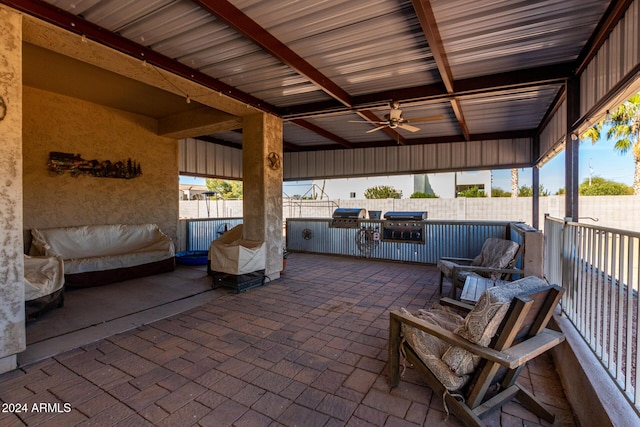 view of patio / terrace with ceiling fan, area for grilling, and grilling area