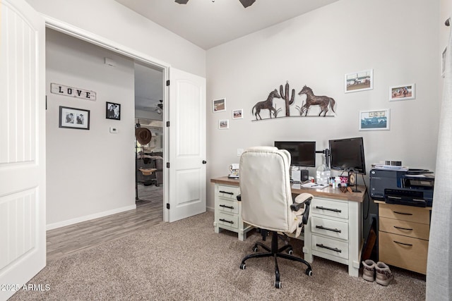 office area with carpet flooring and ceiling fan