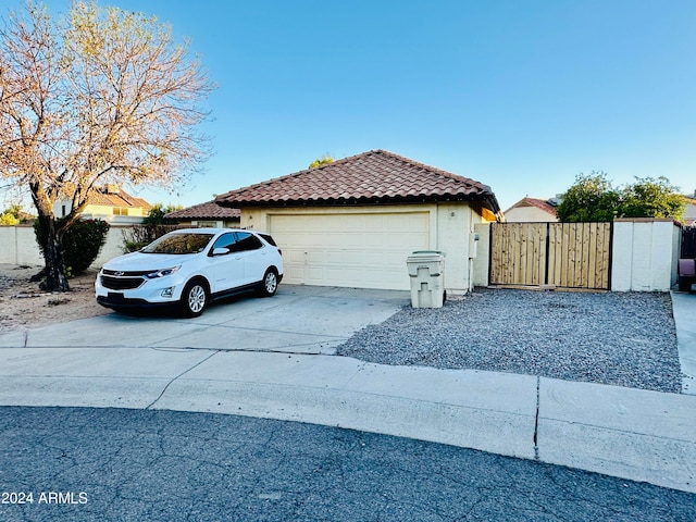 view of side of home featuring a garage