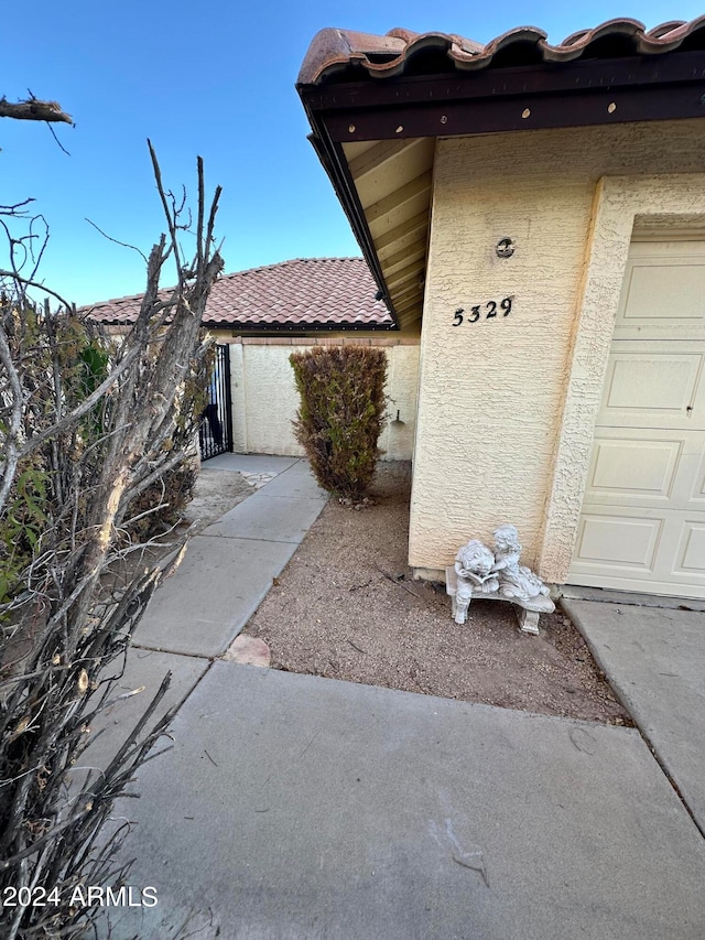 view of patio / terrace with a garage