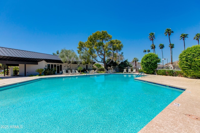 pool with a patio