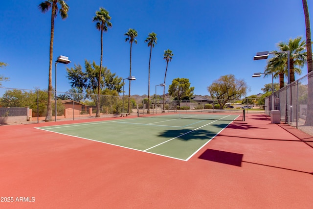 view of sport court with fence and community basketball court