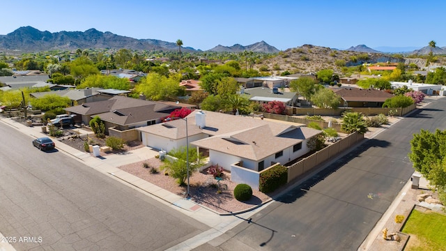 bird's eye view with a mountain view and a residential view