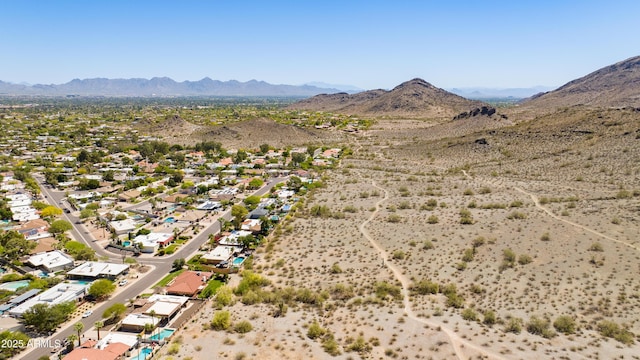 bird's eye view with view of desert and a mountain view
